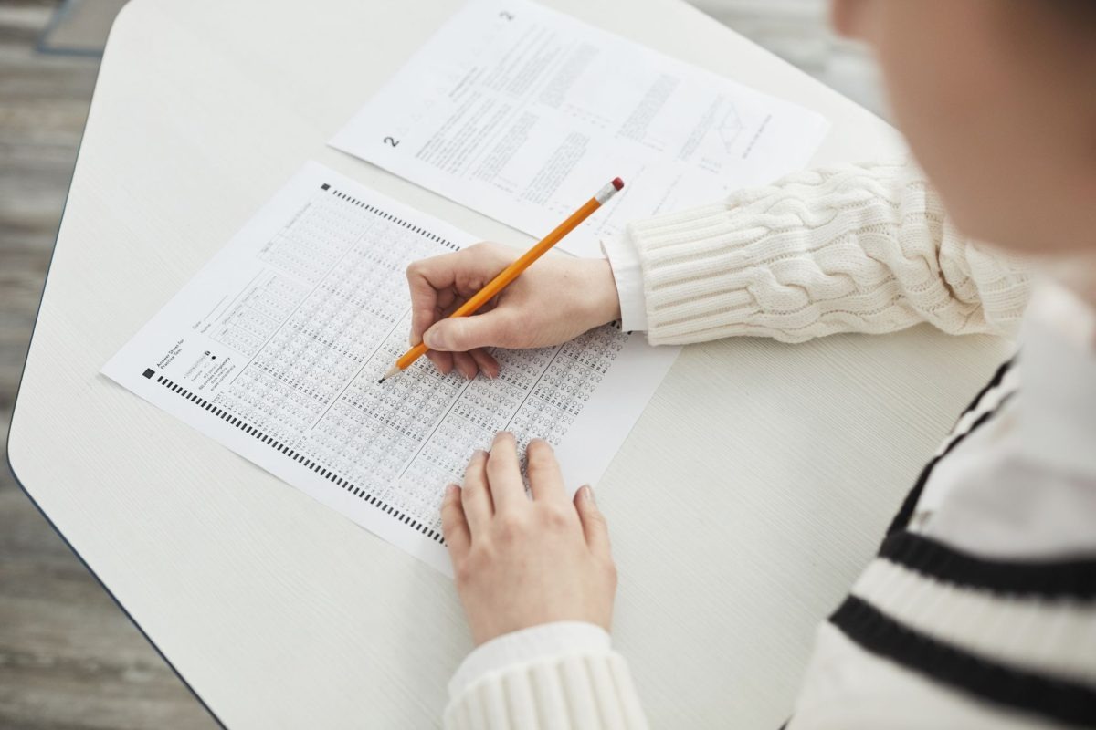 Average IQ by Age: A young boy completing a puzzle during a cognitive assessment